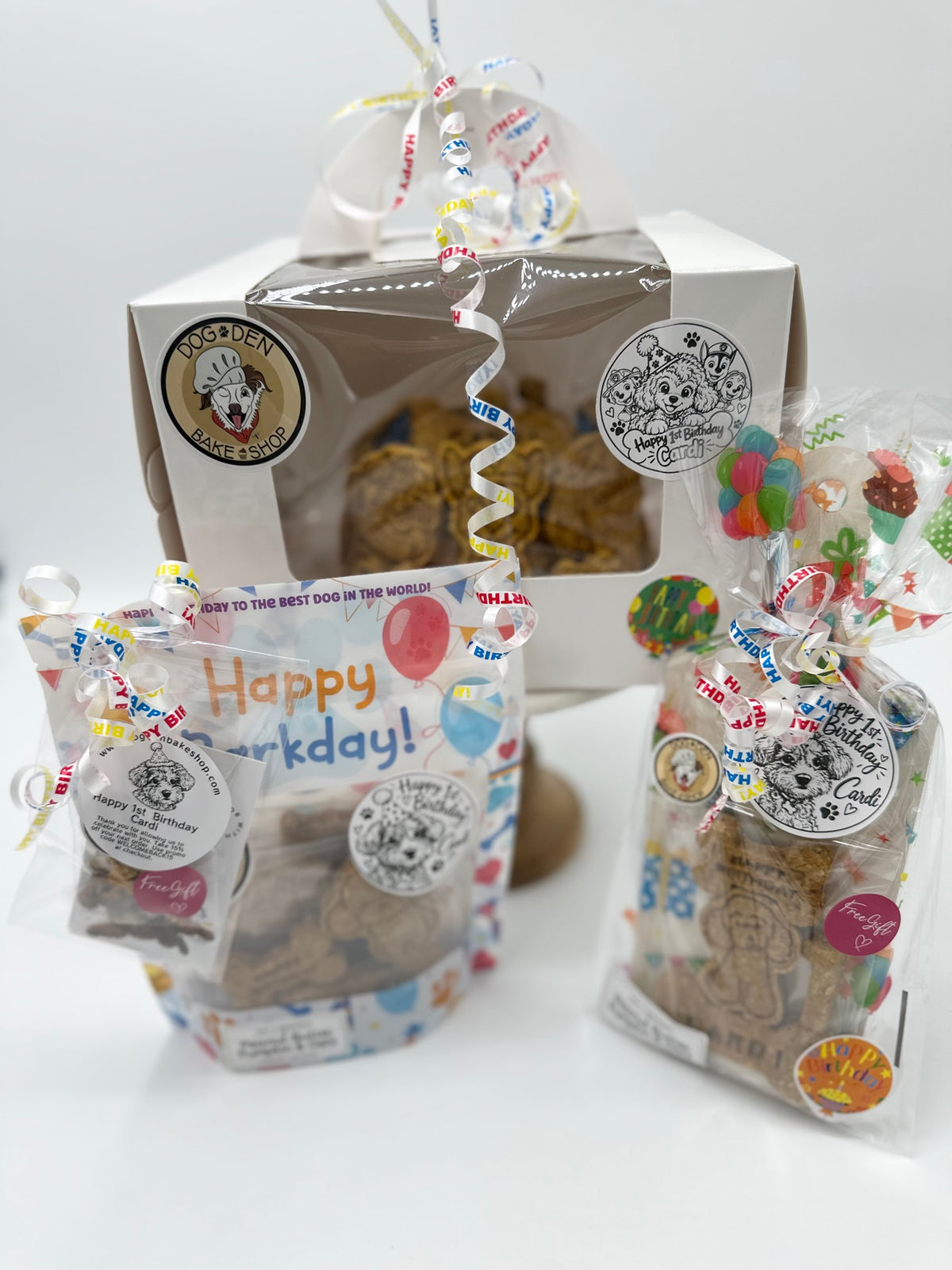 The full birthday package: cake box, birthday treat bag and gift bag